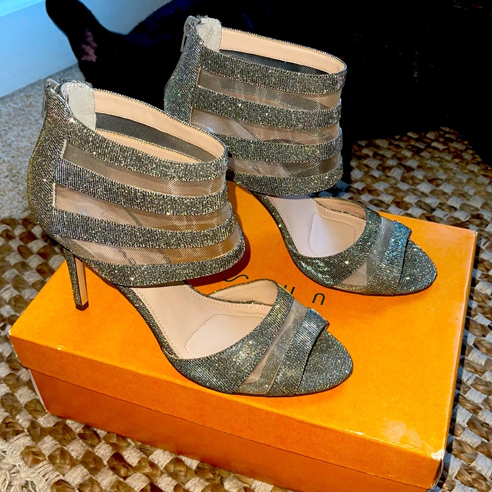 Sparkling silver cuff heels.